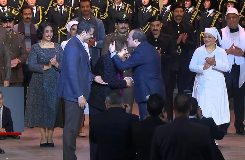 President Sisi goes up to the stage to shake hands with “Samiha Ayoub” and kiss her head... and the artist responds: “Oh dear Egypt, we all love you.”