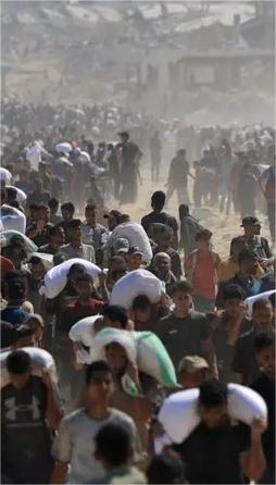 Aid Trucks Enter Gaza, Inspected by Israel