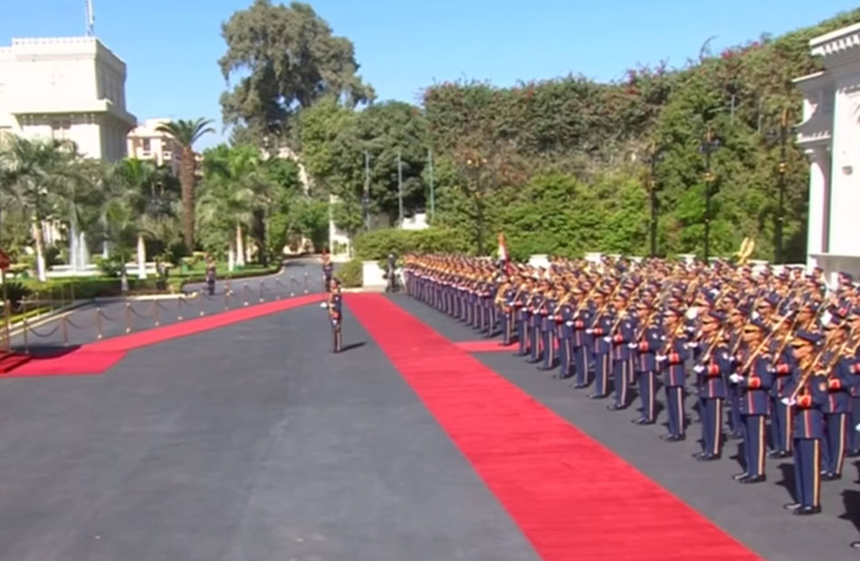 President Sisi and Salva Kiir review the guard of honor at the Ittihadiya Palace