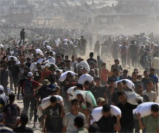 Aid Trucks Enter Gaza, Inspected by Israel
