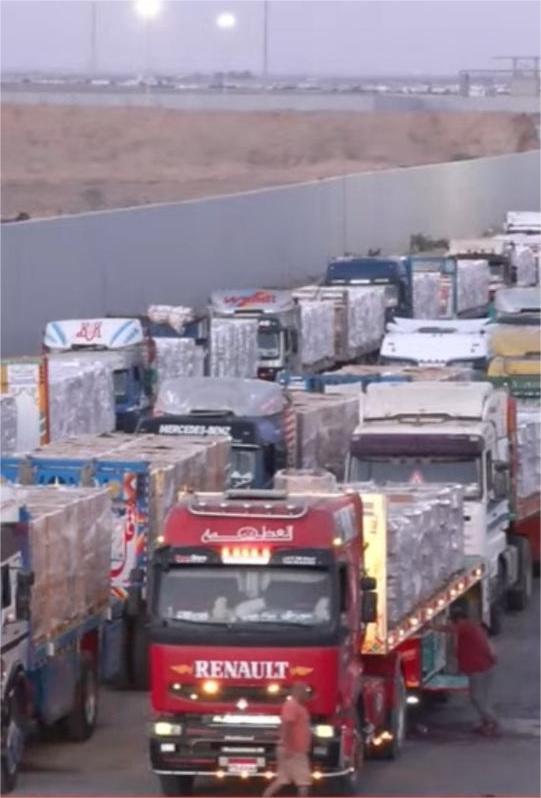 Trucks of the "21" Aid Convoy Move from Egypt to Gaza via the Kerem Shalom Crossing